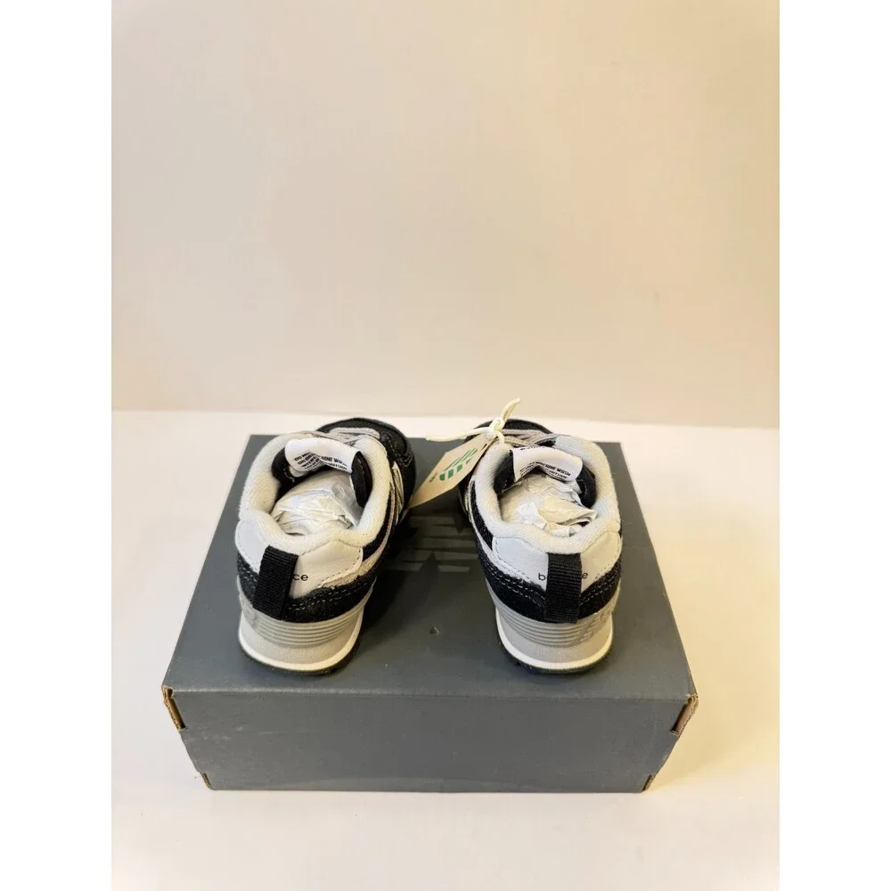 New Balance Kid's 574 Core Bungee Sneaker, Black/White, 2 W Infant (0-12 Months)